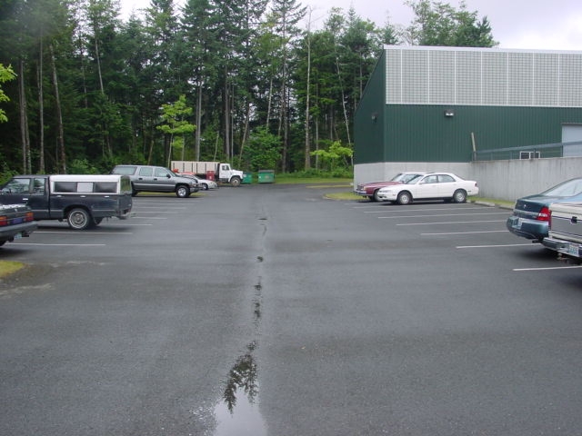 Picture of a cemetery's parking lot.