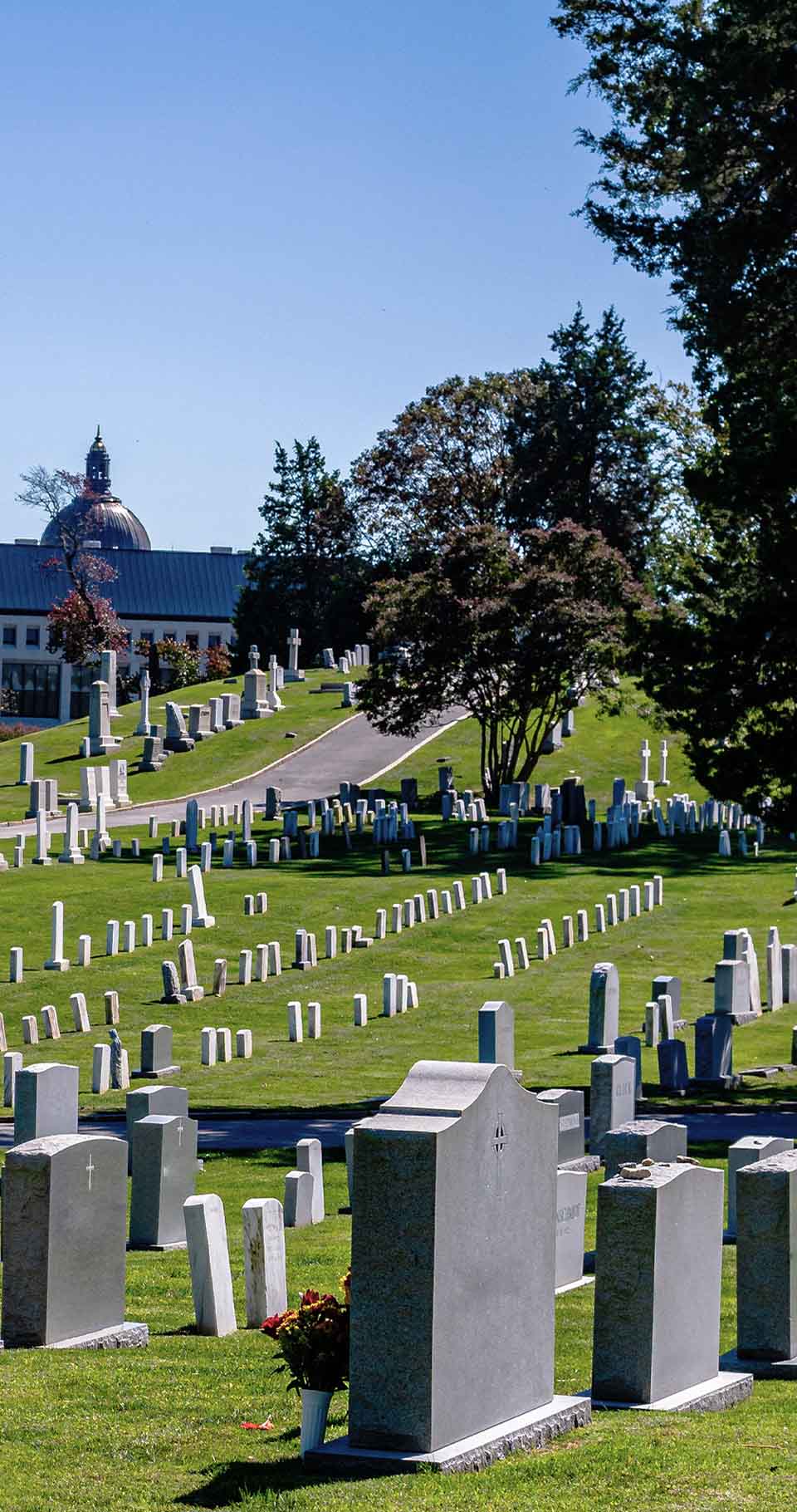 Wide view of a private cemetery on a sunny day