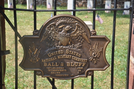 Historic plaque on the gate at Balls Bluff National Cemetery. Historic plaque on the gate at Balls Bluff National Cemetery.