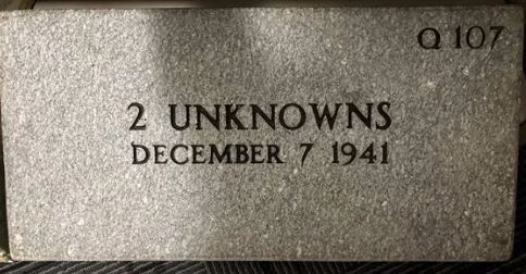 A grave marker that reads Q107, 2 unknowns, December 7 1941.
